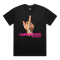 Front view of a black short-sleeve T-shirt printed with a hand holding scissors and raising the middle finger, alongside pink “HAIRDRESSER skye newman” lettering.