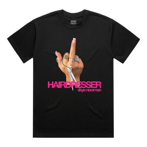Front view of a black short-sleeve T-shirt printed with a hand holding scissors and raising the middle finger, alongside pink “HAIRDRESSER skye newman” lettering.